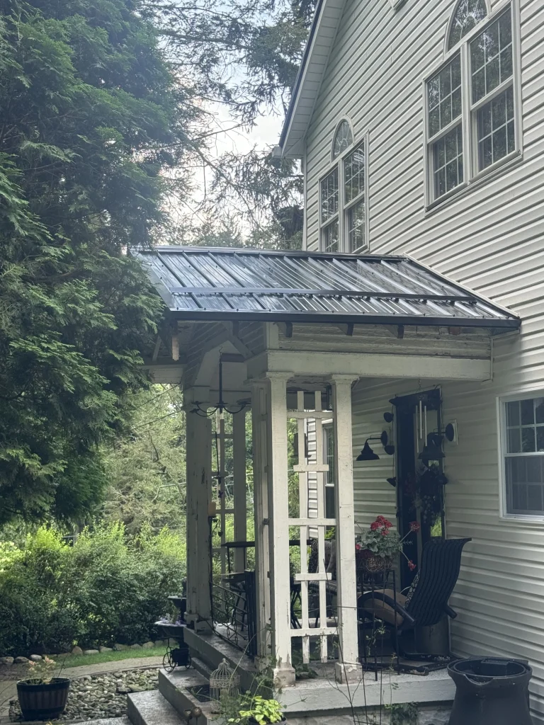 Metal roof installation on front porch structure in Pittsburgh PA residential home