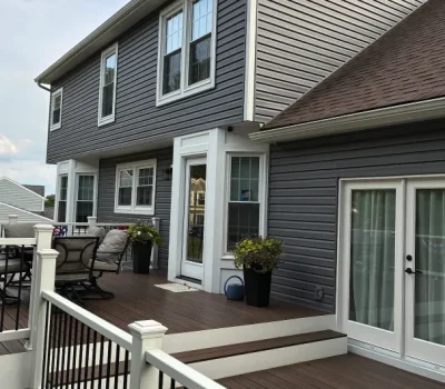 Spacious elevated deck built to enhance outdoor living and seamlessly connect with the home’s layout. Elevated backyard deck installation on two story residential home in Pittsburgh PA