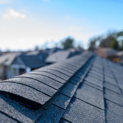 Asphalt shingle room with ridge cap